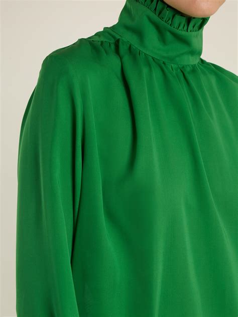 gucci green blouse.